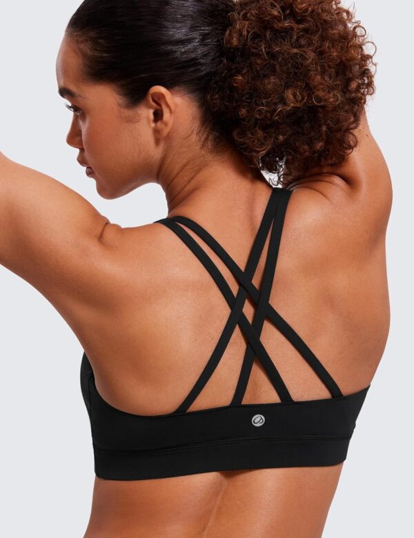CRZ YOGA Women’s Strappy Sports Bras Fitness Workout Padded Yoga Top Criss…