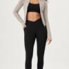 ODODOS Cloud Feeling Gathered Cross Waist Leggings with Pockets for Women…